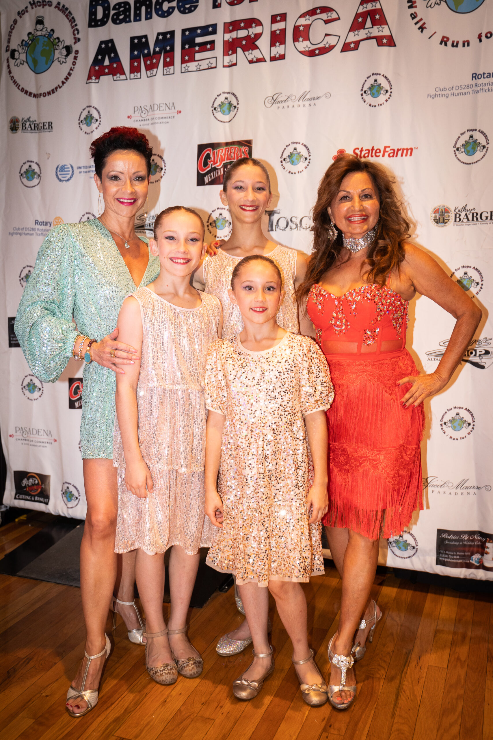 Katarzyna Kozak and Azita Milanian with young Polish dancers